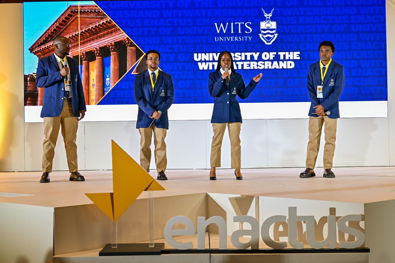 Wits University students present on stage at the Enactus South Africa Expo.