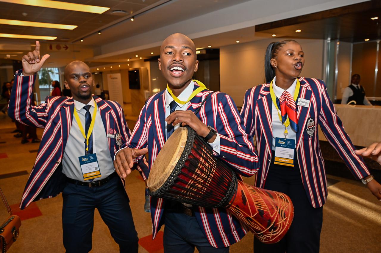 UFS Qwaqwa students perform with a djembe drum at the 2025 Enactus National Event.